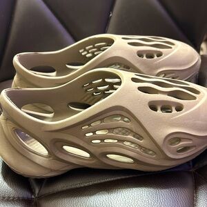 A brownish Yeezy slide